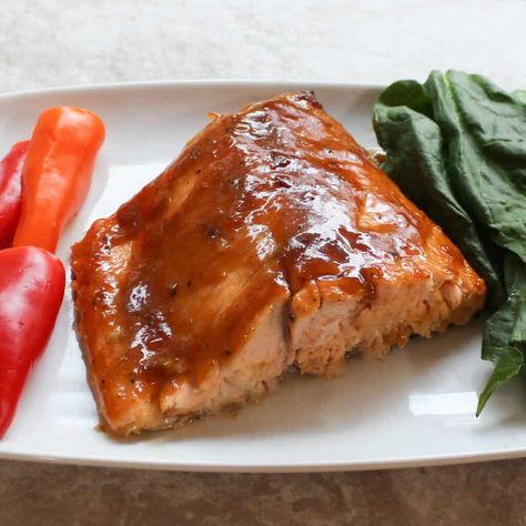 This kosher recipe for Easy Oven Baked Salmon with Apricot Glaze is sweet and savory and has a caramelized coating that is simply amazing! It's ready in just under an hour and only uses 5 ingredients. This recipe is kosher, non-dairy, pareve, and gluten free. Read on to learn how to make the best Easy Oven Baked Salmon with Apricot Glaze recipe from scratch. Fresh Fish Recipes, Apricot Glaze, Salmon Recipes Baked, Good Shabbos, Fish For Dinner, Salmon Glaze Recipes, Oven Baked Salmon, Marinated Salmon, Easy Salmon Recipes