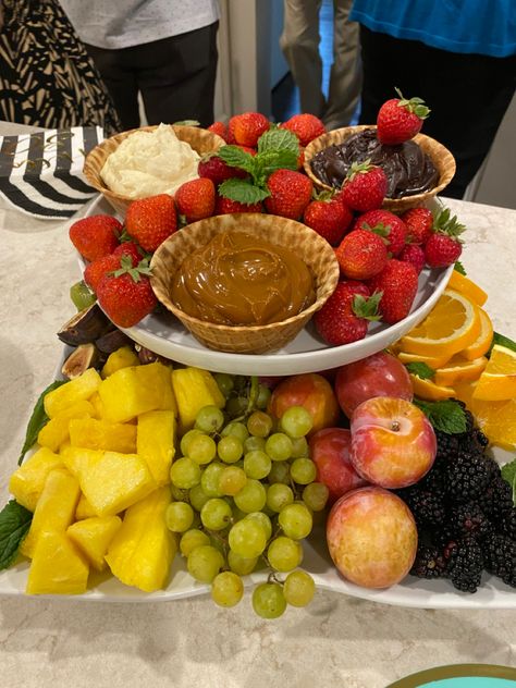 I layered a white ceramic cake stand on top of a white platter. Used the cake stand for three dips (chocolate, lemon cheesecake and dulche de leche) which I served in waffle cone bowls, filled I’m around the bowls with strawberries and then loaded the player with an assortment of whole and cut fruit. Ceramic Cake Stand, Chocolate Lemon, Cake Stand Ceramic, White Platter, Waffle Cone, Waffle Cones, Lemon Cheesecake, Fruit Platter, The Player