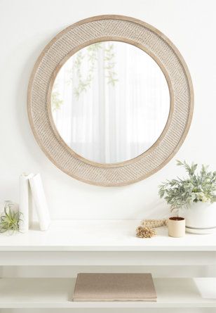 August Grove® Adysson Cannondale Framed Wall Mirror 28" Diameter Natural | Wayfair Round Coastal Mirror, Beachy Mirror, Coastal Mirror, Coastal Mirrors, Boho Mirror, Hallway Mirror, Coastal Aesthetic, Framed Wall Mirror, Nursery Room Design