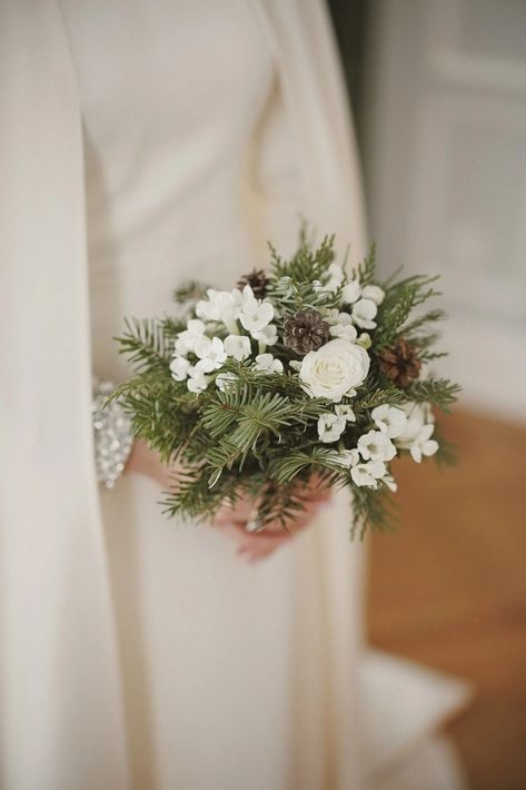 7 Stunning Winter Wedding Bouquet Ideas for Cold-Weather Ceremonies | Vogue Winter Wedding Aesthetic, Small Bridesmaid Bouquets, Classic Wedding Bouquet, Winter Bridal Bouquets, Candlelit Reception, Elopement Bouquet, New England Winter, Winter Floral Arrangements, Winter Wedding Decor