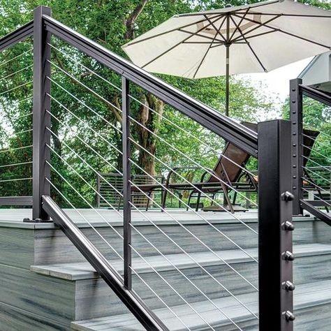 Pro Deck is Kansas City's top deck and rail supplier. Our deck supply store in Kansas City can help you refine your design plans. Call us today! Composite Deck With Iron Railing, Trex Deck With Cable Railings, Trex Deck Drink Rail, Cable Stair Railing, Deck Ballistrades, Aircraft Cable Deck Railing, Composite Railing, Deck Balusters, Deck Railing Systems