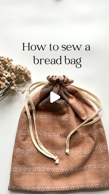 65K views · 2.5K likes | Amelia Mccall- teaching moms to sew children's clothes on Instagram: "🥖Let’s sew a linen bread bag! This is great for sourdough or any homemade bread!🍞  🥖 Cut 4 pieces of fabric measuring 13”x17” (2 main and 2 lining) 🍞Put your main pieces right sides together and make a line 1” down and then another line 3/4” down from that. 🥐Sew down the sides, skipping the part in between the two lines you drew then sew along bottom and other side, again skipping the part in between the lines.  🥖For the lining, sew around 3 sides, leaving a 3” hole for turning it right side out.  🍞Flip lining right side out and put it down inside the main fabric.  🥐Sew all the way around the top of the bag 🥖Close up the hole in the lining  🍞Now sew a tunnel by sewing a line of stitchin Linen Bread Bag, Bread Bag, Bread Bags, Bag Patterns To Sew, Fabric Projects, Sewing Bag, Homemade Bread, Diy Bag, Quilt Sewing