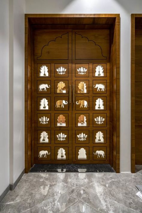 Devghar is a Masterpiece of Craftsmanship, a Sanctuary of Spiritual Reflection Stone Partition Design, Simple Pooja Room Ideas, Pooja Room Door Design Traditional, Pooja Room Ideas Indian Traditional, Rajasthani Interior, Indian Pooja Room, Pooja Room Ideas Indian Modern, Puja Room Design Indian, Puja Door