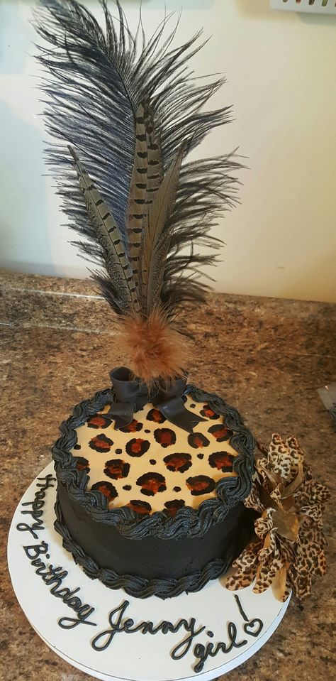 Cheetah print cake I made. The cake is a chocolate cake covered in chocolate buttercream icing. Black fondant bow that I made with hand painted cheetah spots. Like us on Facebook @ Da VaCh Cake Designs. Cheetah Print Cake, Cheetah Print Cakes, Leopard Cake, Leopard Print Cake, Chocolate Buttercream Icing, Cheetah Spots, Fondant Bow, Black Fondant, Buttercream Icing