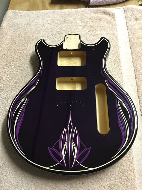 Custom Painted Electric Guitar, Bass Guitar Custom Paint, Custom Guitar Paint Jobs, Decorative Guitar, Pinstripe Designs, Pinstripe Helmet Design, Pinstripe Guitar, Ukulele Design, Purple Guitar