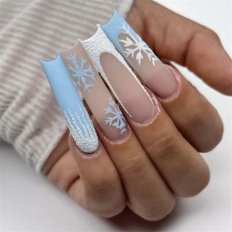 Product Description: Add a touch of frosty elegance to your holiday look with our Sky Blue Snowflake Press-On Nails! These stunning nails feature a soft, icy blue base with intricate snowflake designs, capturing the essence of winter wonderlands. Perfect for the Christmas season, these nails bring both a festive and chic look to your fingertips. The coffin-shaped design adds a trendy and modern flair to your manicure, offering a sleek, elongated appearance. Each set comes with 24 press-on nails, Blue Christmas Nails, Diy Acrylic Nails, Winter Nails Acrylic, Nails Christmas, Snowflake Nails, Dope Nail Designs, Coffin Shape Nails, Christmas Nails Acrylic, Long Square Acrylic Nails