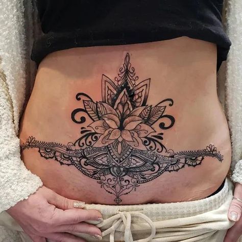 Tummy Tuck Tattoo: What You Need to Know | Art and Design Stomach Scar Tattoo Cover Up, Scar Tattoo Cover Up, Scar Tattoo Ideas, Tummy Tucks Tattoo Cover Up, Feminine Stomach Tattoos, Tuck Tattoos, C Section Scar Tattoo, Couple Tats, Lower Belly Tattoo