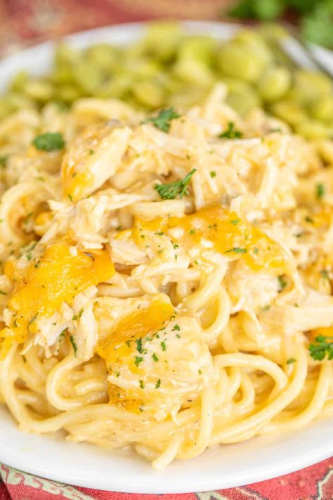 Cheddar Chicken Spaghetti Recipe - cheesy chicken pasta baked in a creamy sauce. Dangerously delicious! We ate this two days in a row!! Comfort food at its best. Spaghetti, chicken, chicken broth, cream of chicken, cream of mushroom, Worcestershire sauce, onion, garlic, and sharp cheddar cheese. Can make in advance and refrigerate or freeze for later. Great dish for a potluck! Chicken Cream Of Mushroom, Spaghetti Chicken, Baked Chicken Spaghetti, Chicken Tetrazzini Recipes, Cheesy Chicken Pasta, Easy Chicken Casserole Recipes, Cheesy Chicken Spaghetti, Chicken Spaghetti Recipes, Chicken Casserole Easy