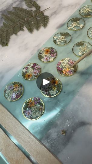 24K views · 1.6K reactions | Trying to capture how much detail is in these tiered beauties✨
They’ll be available at my upcoming markets! More info TBA🌷
Resin: @letsresin 

#resin #resinart #resinjewelry #resinflowers #pressedflowers #flowerpreservation #jewelry #handmade #handmadejewelry #flowers #flowerjewelry #flowerart #nature #natureart #naturejewelry #botanical #botanicaljewelry #botanicalart #etsy #shopsmall #michiganmade #michiganmade #slowmade #shoplocal | Zoe Ray Tracey | JVKE · clouds Resin Jewelry Diy, Botanical Jewelry, Resin Flowers, How To Preserve Flowers, Nature Jewelry, Jewelry Diy, Flower Jewellery, Botanical Art, Jewelry Handmade