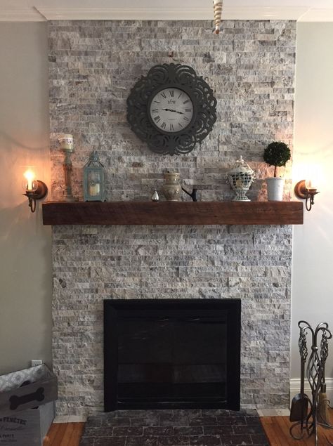 Silver Travertine stacked stone and reclaimed wood mantel !  renovated old chimney that was in bad shape.  This turned out gorgeous! Reface Fireplace, Chimney Decor, Silver Travertine, Cast Stone Fireplace, Stacked Stone Fireplaces, Fireplace Redo, Stone Fireplace Mantel, Stone Fireplace Surround, Wood Mantel