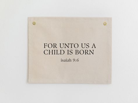 "Remember the reason for the season with this \"Isaiah 9:6\" canvas banner. Place it above the mantle or on any empty wall for all to see. More holiday sayings available here: https://www.etsy.com/shop/shesawildflowerco?ref=seller-platform-mcnav&section_id=38576850 DETAILS: Dimensions: 16\" x 20\", 24\" x 30\" or 28\" x 35\" Material: High quality 10oz natural cotton duck canvas and 3/8\" brass grommets Text available in nine vinyl colors: Blue, aqua, olive, melon, lilac, mustard, rust, red and black Hang with clear thumb tacks or nails CARE INSTRUCTIONS: To flatten fold creases, set your iron to medium heat or the steam setting. Place the iron on the creases for 2-3 seconds or until flat. Avoid leaving the iron in the same spot for too long. Do not iron directly on the vinyl design. Do no Canvas Banner Diy, Jesus Christmas Bible Verse, Christmas Bible Verse Painting, Christian Christmas Signs And Sayings, Cricut Wooden Signs Christmas With Bible Verses, Christian Christmas Signs, Jesus Christmas Decorations, Bible Verse Tapestry, Biblical Christmas