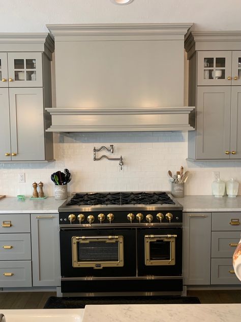 We are so happy that we selected this 48” Big Chill gas range for the kitchen! I opted to go with it in black and chose brass finish knobs and doors. This is probably my favorite part of our kitchen. Big Chill Classic Range, Black Range In Kitchen, Modern Kitchen Gas Stove, Black Oven Kitchen, Gas Stove With Hood, Gas Ranges In Kitchen, Black Kitchen Range, Black Gas Stove, Greige Kitchen Cabinets