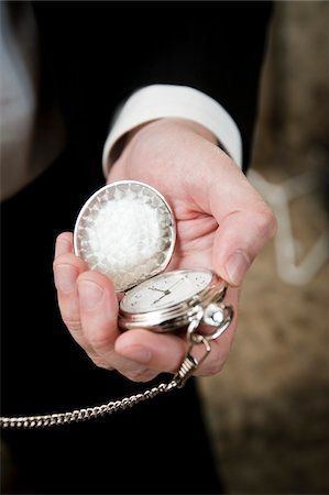 Habd holding an open pocket watch attached to a chain. Hand Holding Pocket Watch, Watch Photo, Hand Holding, Pocket Watch, Close Up, Rings For Men, Silver Rings, Resolution, Stock Photos