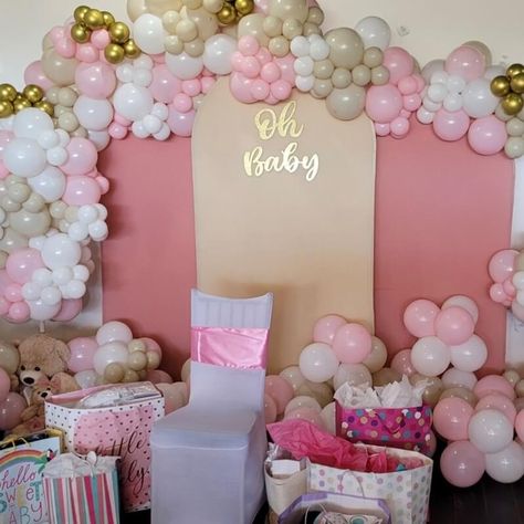 Throw a super sweet baby girl shower party and set up an endearing backdrop. Arrange round Chiara backdrop stands covered in blush & beige spandex fit covers along with an “Oh Baby” signage and create a pink, white, metallic gold, & beige balloon garland to heighten its charm. Place teddy bear plushies holding balloons on the floor along with plenty of balloons. Set a photobooth chair adorned with white spandex cover and pink sash and dress up the dessert table in a pink tulle tutu table skirt. Beige Balloon Garland, Teddy Bear Plushies, Tutu Table Skirt, Event Decor Ideas, Party Decorations Table, Pink Sash, Decorations Table, Table Skirt