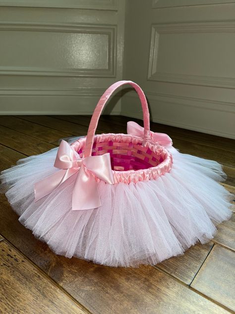 "This Pink Tutu Easter Basket has a mix of Light and Dark Pink Tulle trimmed in Pink Satin Ribbon.  Basket opening is 8.5\". Height from bottom to top of handle is approx 11\".  Like this basket but need a different color?  Please visit my other listings.  I can make any color basket to match any of my custom made dresses.  The inside is not lined." Baby Girl Easter Basket, Tutu Easter Basket, Ribbon Basket, Easter Tutu, Homemade Perfume, Girls Easter Basket, Custom Made Dresses, West Berlin, Baby Baskets