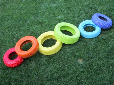 I went to a local tire shop and got different sized tires from their garbage pile, spray painted them with primer and then with the colour. Kindergarten Playground, Daycare Playground, Tire Playground, Diy Kids Playground, Backyard Obstacle Course, Painted Tires, Tire Craft, Obstacle Courses, Play Ground