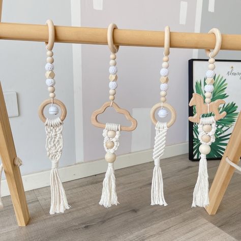 View Play Gym Toys by HandcraftedFairyland on Etsy Baby Hanging Toys, Play Gym Toys, Natural Baby Toys, Baby Tummy Time, Wooden Baby Gym, Perfect Photography, Baby Gym Toys, Macrame Baby, Tummy Time Mat