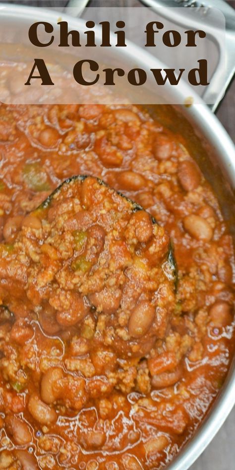 A close up shot of a big pot of chili with text overlay. Crockpot Chili For A Crowd, Easy Chili For A Crowd, Chili For 15 People, Big Pot Of Chili, Bulk Chili Recipe, Chili For Large Group, Chili For 25 People, How Much Chili For 50 People, Chili For A Large Crowd