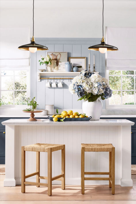 Designer tip: Add a mix of wovens, brass, and blue to make a style statement. Island In Small Kitchen, Light Blue Kitchen, Pottery Barn Kitchen, Cottage Modern, Barn Kitchen, Decor Pottery, Wood Island, Kitchen Island Decor, Island Decor