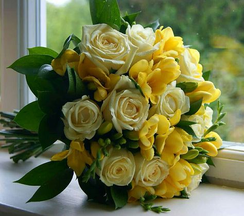 Beautiful Wedding Bouquet Showcasing: Pastel Yellow Roses, Yellow Freesia + Green Foliage Freesia Wedding Bouquet, Yellow Freesia, Roses Yellow, Marriage Reception, Reception Ceremony, Yellow Bouquets, Yellow Theme, Green Foliage, Pastel Yellow