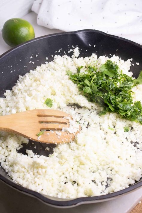 I'm sure you've noticed that riced cauliflower is all the healthy rage! It seems to be everywhere! You'll understand why when you try this yummy recipe for Cilantro Lime Cauliflower Rice. Riced cauliflower paired with the delicate flavors of lime and cilantro tastes fresh and delicious. Quick, simple and delicious. #easyricedcauliflowerrecipe #cilantrolimericedcauliflower #deliciousricedcauliflowerlimeandcilantro Chipotle Rice, Lime Cauliflower Rice, Cilantro Lime Rice Recipe, Lime Rice Recipes, Living Rich, Cilantro Lime Cauliflower Rice, Riced Cauliflower, Cauliflower Rice Recipes, Arroz Frito