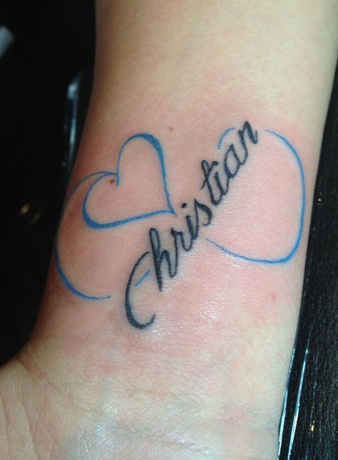 Name tattoos for women doesn't always have to be just text or monochromatic. Check out these creative examples for your reference. Name Tattoos For Girls, Name Tattoos For Moms, Celtic Tattoo Designs, Name Tattoos On Wrist, Heart Tattoo Wrist, Baby Name Tattoos, Infinity Tattoos, Small Wrist Tattoos