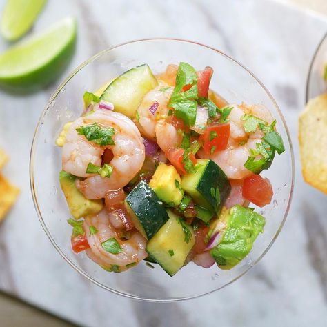 With its fresh ingredients and zesty sauce, our Mexican shrimp cocktail will transport your taste buds to the sunny beaches of coastal Mexico. How To Clean Shrimp, Mexican Shrimp Cocktail Recipe, Shrimp Cocktail Recipe, Recipe With Tomatoes, Mexican Shrimp Cocktail, Cocktail Shrimp Recipes, Mexican Shrimp, Mexican Snacks, Zesty Sauce