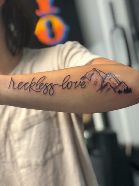 Reckless Love of God female forearm tattoo with mountains Reckless Love Of God Tattoo, Reckless Love Tattoo, Reckless Tattoo, Tattoo With Mountains, Female Forearm Tattoo Ideas, Female Forearm Tattoo, Reckless Love Of God, Tattoo Ideas Female Forearm, Tato Lengan Bawah