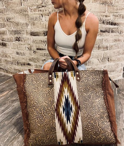 Please note that every weekender will be one of a kind as each new weekender will be made with a unique new cowhide. If you would like to pick your hide, please send a message. Please go to About > Frequently Asked Questions To learn more about the terms of your purchase. The Shimpz Myra Weekender is a must have for any closet!! This bag is made of vintage fabrics and tooled leather. Width 20 Height 16 Depth 8.5 Myra Bags Outfit, Western Bags Purses, Myra Bags, Carpet Bags, Bags Outfit, Concealed Carry Bags, Im So Fancy, Overnight Travel Bag, Western Purses