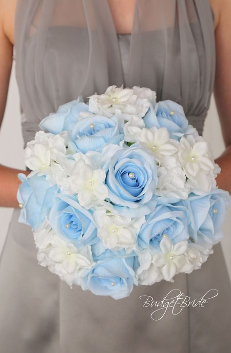 This stunning brides bouquet is an all round bouquet with Capri blue roses each with a pearl center, ivory hydrangea and white stephanotis with pearl centers. This bouquet is approx 12 inches wide Vintage Theme Wedding, Ice Blue Weddings, Ivory Hydrangea, Cinderella Quinceanera Themes, Light Blue Quince, Cinderella Quinceanera, Quinceanera Bouquet, Sky Blue Weddings, Bridal Wedding Bouquet