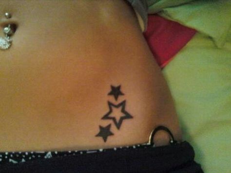 3 star tattoo 2000 Star Tattoo, Star Tattoo On Lower Stomach, Star Flare Tattoo, Thick Star Tattoo, Filled In Star Tattoo, Star Hip Tattoos Women, Stars On Stomach Tattoo, Star Womb Tattoo, Star Tattoo Pelvis