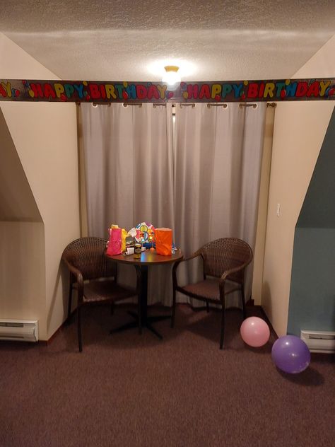 a hotel room with a banner across the top that says happy birthday. there's two empty chairs, some balloons on the floor, and goodie bags on the table in the center. Horror Images, Strangely Familiar, Surreal Places, Brain Parts, Familiar Places, Core Board, Space Birthday Party, Sgt Pepper, Feeling Disconnected