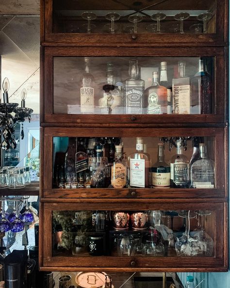 Kitchen & Bar Photo Dump ⬇️ . Someday I’m going to have a better photographer in here to show me how to photograph a space with a mirrored backsplash. . It’s SO cool. . And of course it would have been easier to use regular cabinetry for the bar: but the antique barrister bookcases are WAY cooler (yes, they were ridiculously reinforced and over engineered by my favorite over-engineered). . These are random corners of the kitchen. . What do you have questions about? Mirrored Backsplash, Bookcase Ideas, Barrister Bookcase, Mirror Backsplash, How To Photograph, Best Photographers, So Cool, The Bar, Kitchen Bar