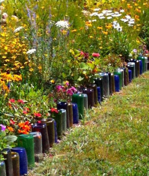 Garden Edging – How To Do It Like A Pro Backyard Envy, Wine Bottle Garden, Flower Bed Borders, Bottle Trees, Recycled Wine Bottles, Gardening Projects, Garden Fun, Gardening Diy, Recycled Glass Bottles