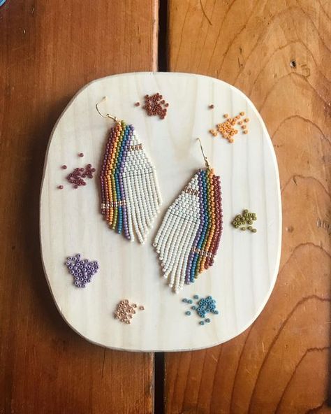 Ridge & River on Instagram: "Some dainty glam on the Sarah Earrings. ✨🌈 . . . More retro rainbow in the works! *smol bear approved as always* . . . . . . #beadedearrings #seedbeadearrings #seedbead #beadedjewelry #beaded #ridgeandriver #handmade #handmadejewelry #madeinalaska #womenowned #sustainablymade #instagood #fringeearrings #smallbusiness #beadedjewelry #beadedjewelryofinstagram #smallbusiness #shoplocal #womensupportingwomen #shopsmall #alaska #jewelrymaker #jewelrymakersofinstagram #su Seed Bead Jewelry Patterns, Bear Earrings, Retro Rainbow, Jewelry Beaded, Earrings Beaded, Bead Jewelry, Seed Bead Earrings, Bead Jewellery, Seed Bead Jewelry