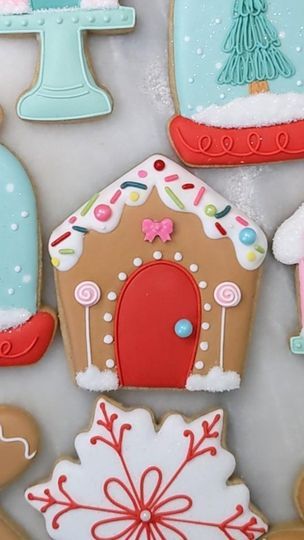 A few of my favorite Christmas cookies - gingerbread houses, cake stands, snow globes, and anything pink! I used Sweet Sugarbelle's shape shifter pocket cutter for this gingerbread house. #gingerbreadcookies #gingerbreadchristmas #christmascookies #christmasdecoratedcookies #bakinggrandma #gingerbreadhouse @acfoodcrafting @sweetsugarbelle | Heidi Thurston | Percy Faith & His Orchestra · My Favorite Things Gingerbread House Sugar Cookies, Favorite Christmas Cookies, Anything Pink, Sweet Sugarbelle, Cookies Gingerbread, Icing Techniques, Shape Shifter, Christmas Cookies Decorated, Gingerbread Houses