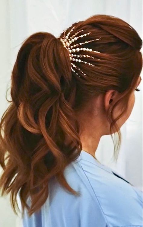 Back view of an auburn haired model with her hair styled in a voluminous, waved, high ponytail, accessorised with a gold and pearl hair accessory that fits round the base of the ponytail and radiates up and out through the hairstyle like the rays of the sun. High Ponytail Accessories, Bridal High Ponytail, Reception Hairstyle, Ponytail Accessories, Wedding Ponytail Hairstyles, Bridal Ponytail, Glamorous Wedding Hair, Wedding Ponytail, Ponytail Hairstyles Tutorial