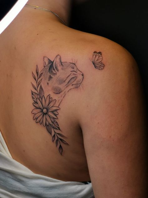 Cat memorial tattoo, with flowwr and butterflies Pet Tribute Tattoo Cat, Kitten Memorial Tattoo, Tattoo For Animal Passing, Cat Name Tattoo, Dead Cat Tattoo, Tattoos For Cats That Passed, Pet Memorial Tattoo Cat, Cat Remembrance Tattoo, Cat Memorial Tattoo