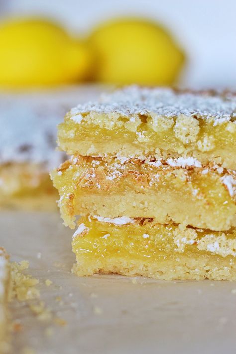 With a soft and chewy shortbread crust and a tart and gooey lemon filling, these Legendary Lemon Bars are a favorite in our house! Lemon Desserts Bars, Orange Bars, Lemon Cake Bars, Cake By Courtney, Lemon Bars Easy, Lemon Bars Recipe, Lemon Squares, Perfect Chocolate Chip Cookies, Lemon Bars