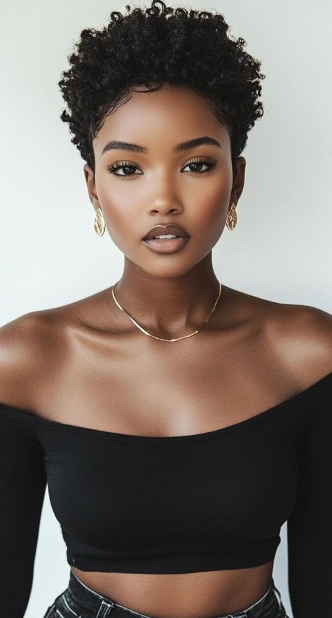 Experience trendy and textured short haircuts for black women that celebrate natural hair. These styles enhance your curl pattern and add dimension. From defined coils to voluminous crops, find a cut that showcases your hair's natural beauty and keeps you looking fresh. Natural Hair Tapered Haircut Black Women, Medium Short Hair Black Women, Short Curly Haircut Black Women, Pixie Afro Haircut, Short Haircut Natural Hair Black Women, Tampered Short Natural Hair, Short Afros For Women Natural Hair, Curly Mushroom Haircut Black Women, Natural Twa Hairstyles For Black Women