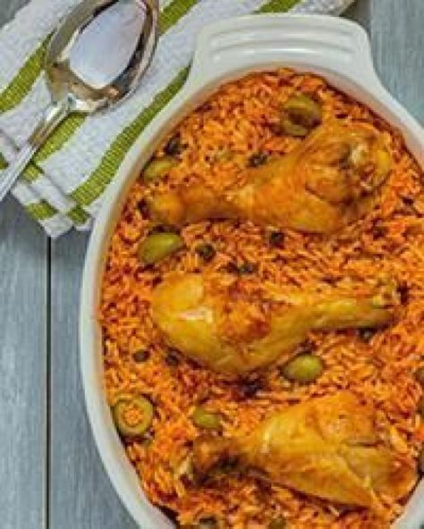 Arroz con Pollo (Puerto Rican Rice with Chicken) | This easy Puerto Rican rice recipe with bone-in chicken serves six and is ready in less than an hour. #ChickenHouses Puerto Rican Rice Recipe, Puerto Rican Rice, Recetas Puertorriqueñas, Rice And Chicken, Rice With Chicken, Bone In Chicken, Puerto Rico Food, Boricua Recipes, Spanish Dishes