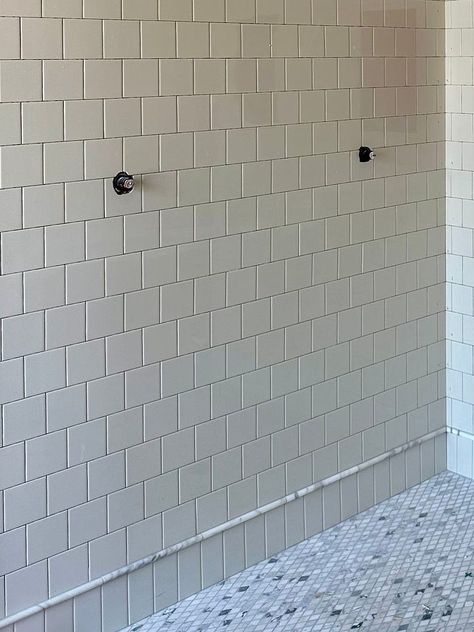 3 Things I've Learned From Our Recent New Build Timeless Master Bath, Tile Baseboard, Subway Tile Showers, Tile Layout, Primary Bath, Tile Countertops, Bathroom Shower Tile, Tile Inspiration, House Remodel