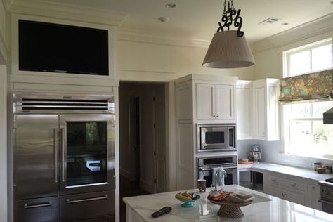 This 50″ Samsung HDTV is custom mounted within a niche above the refrigerator, using a full motion TV bracket. This TV is paired with a set of 7″ In-Ceiling type speakers for TV playback and music streaming. Swivel Tv Stand, Ceiling Types, Tv In Kitchen, Bluffton Sc, Tv Bracket, Kitchen Images, Kitchen Island Lighting Pendant, New Kitchen Cabinets, Installing Cabinets