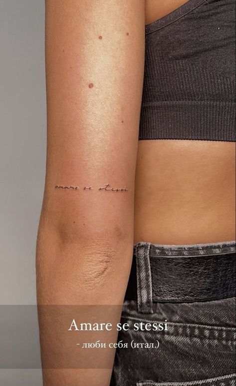 Family Above All Tattoo, Tatoos Above The Elbow, Word Tattoo Locations For Women, Small Above Elbow Tattoo, Felicita Tattoo, Tattoo Back Of Elbow, Small Phrase Tattoos For Women, Back Of Elbow Tattoo, Tattoo Above Elbow