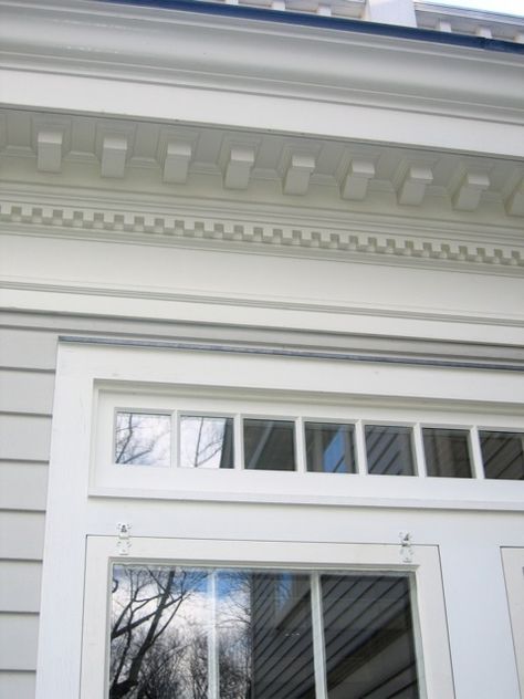 clips holding the storm windows; accurate historic reproductions with weight + pulley counterbalances + visible brass chains on the inside.  storms and screens are wood as well; exchanged twice a year, effective. Exterior Dental Molding, Dental Molding Trim Exterior, Exterior Dentil Molding, Dentil Moulding Exterior, Dental Moulding, Mid Century Colonial, Garrison Colonial, Portico Entry, Exterior Molding