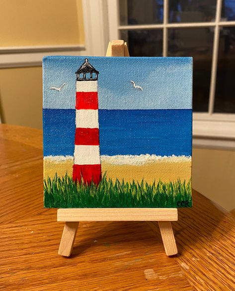 Mini canvas of lighthouse (mini easel included) Painting Canvas Easy Simple, One Canvas Many Paintings, Things To Paint Other Than Canvas, Paintings Blue Background, Easy Lighthouse Painting For Beginners, Painting Ideas As A Gift, Cute Landscape Paintings Easy, Stuff To Paint With Watercolor, Painting Ideas Canvas Acrylic