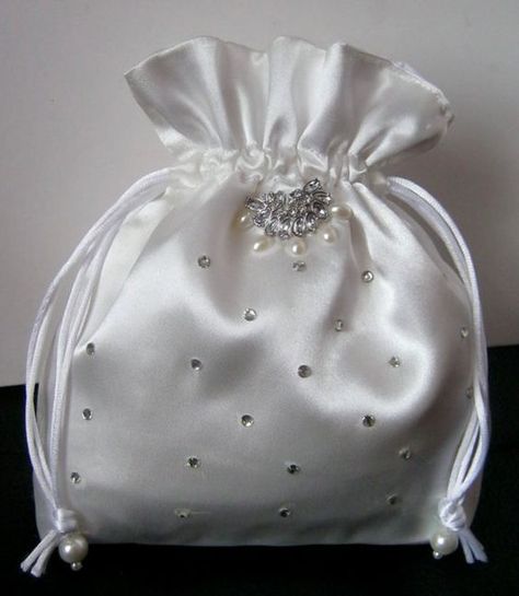 What To Do With Your Wedding Dress After The Wedding – Budgeted Wedding Wedding Dress After The Wedding, Wedding Dress Keepsake, Hand Made Bag, Wedding Dress Crafts, Bride Bag, Bridal Handbags, Bridal Purse, Diy Bag Designs, Bag Flower