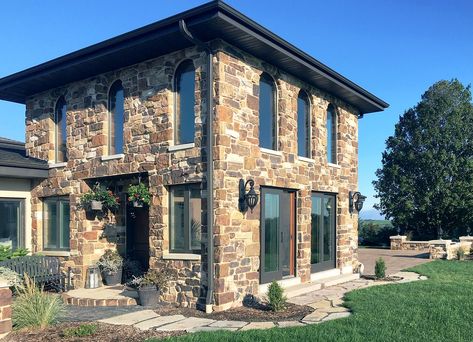 Modern rustic exterior veneer stone home www.buechelstone.com/project/modern-rustic-exterior-castl... facade features Antique Copper Country Castle Rock & Tamarack Siena for exterior castle stone veneer complementary to stucco w/ outdoor living patio stone fireplace. Mortar masonry (vs dry stacked stone) in castle field ledge stone veneer pattern. DIY blog www.buechelstone.com/masonry/ shows how to install stone veneer. Buy stone veneer natural stone cut by Buechel Stone! #StoneVeneer #Masonry # Modern Rustic Exterior, Fireplace Mortar, Buechel Stone, Veneer Pattern, Castle Stone, Patio Stone, Dry Stack Stone, Veneer Stone, Rustic Exterior