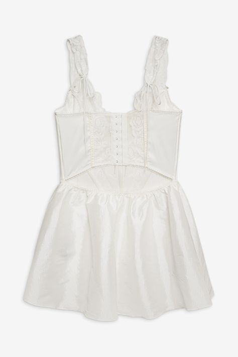 Sweet and enchanting, the Isabella white slip dress transports you to a world of elegance with its vintage-inspired charm. Featuring pin-tucked satin panels, this mini slip is adorned with a Rococo rose lace trim, metallic rosette clusters, and a full gathered taffeta skirt. Consider it the perfect bridal lingerie for any wedding night or bachelorette celebrations. Slip Dress White, Taffeta Skirt, White Slip Dress, Mini Slip, Rose Lace, White Slip, Wedding Lingerie, Bridal Lingerie, Wedding Night