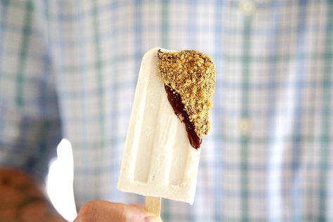 Cheesecake popsicles dunked in melted chocolate magic shell and rolled in crushed graham cracker crumbs. Customize and add cherries for a cherry cheesecake popsicle! #cheesecake #popsicles #icepops #frozendessert #cheesecakepopsicle Cheesecake Popsicles, Frozen Cheesecake, Frozen Dessert Recipe, Dessert For Two, Cold Treats, Cherry Cheesecake, Cake Recipes From Scratch, Easy Cheesecake, Ice Cream Popsicles